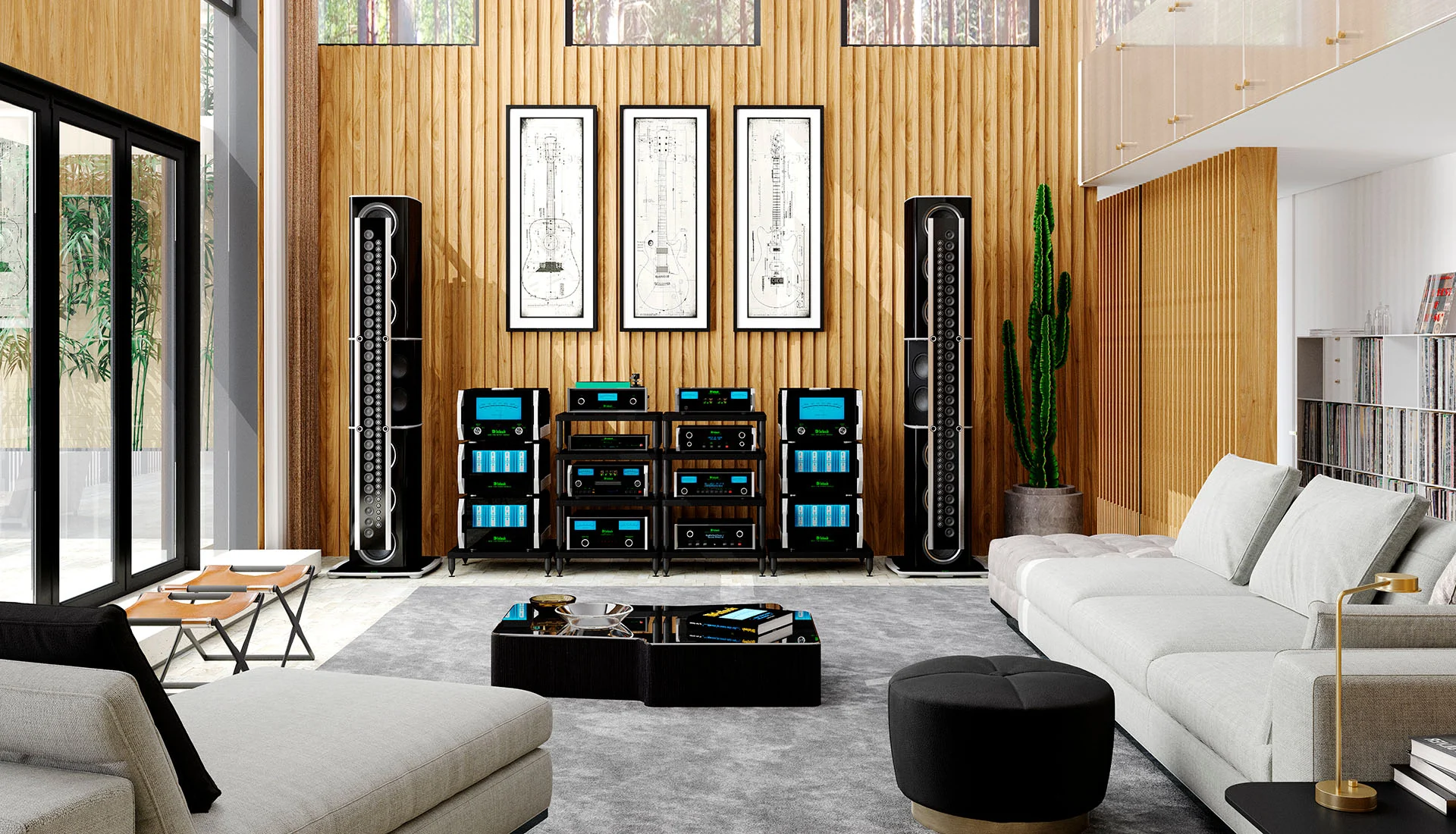 Poslechový pokoj se sestavou McIntosh Reference Music System — rack komponent s modrými měřiči a dvojicí sloupových reprosoustav