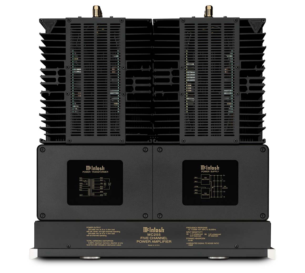 Pohled na horní stranu McIntosh MC255 se čtyřmi chladiči Monogrammed Heatsinks™ a schématy napájecího transformátoru a zdroje