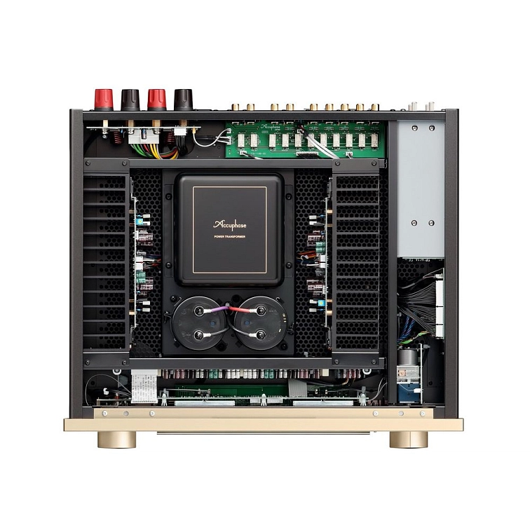 Accuphase E-380 z ptačí perspektivy se sejmutým krytem — symetrické uspořádání obvodů kolem centrálního transformátoru