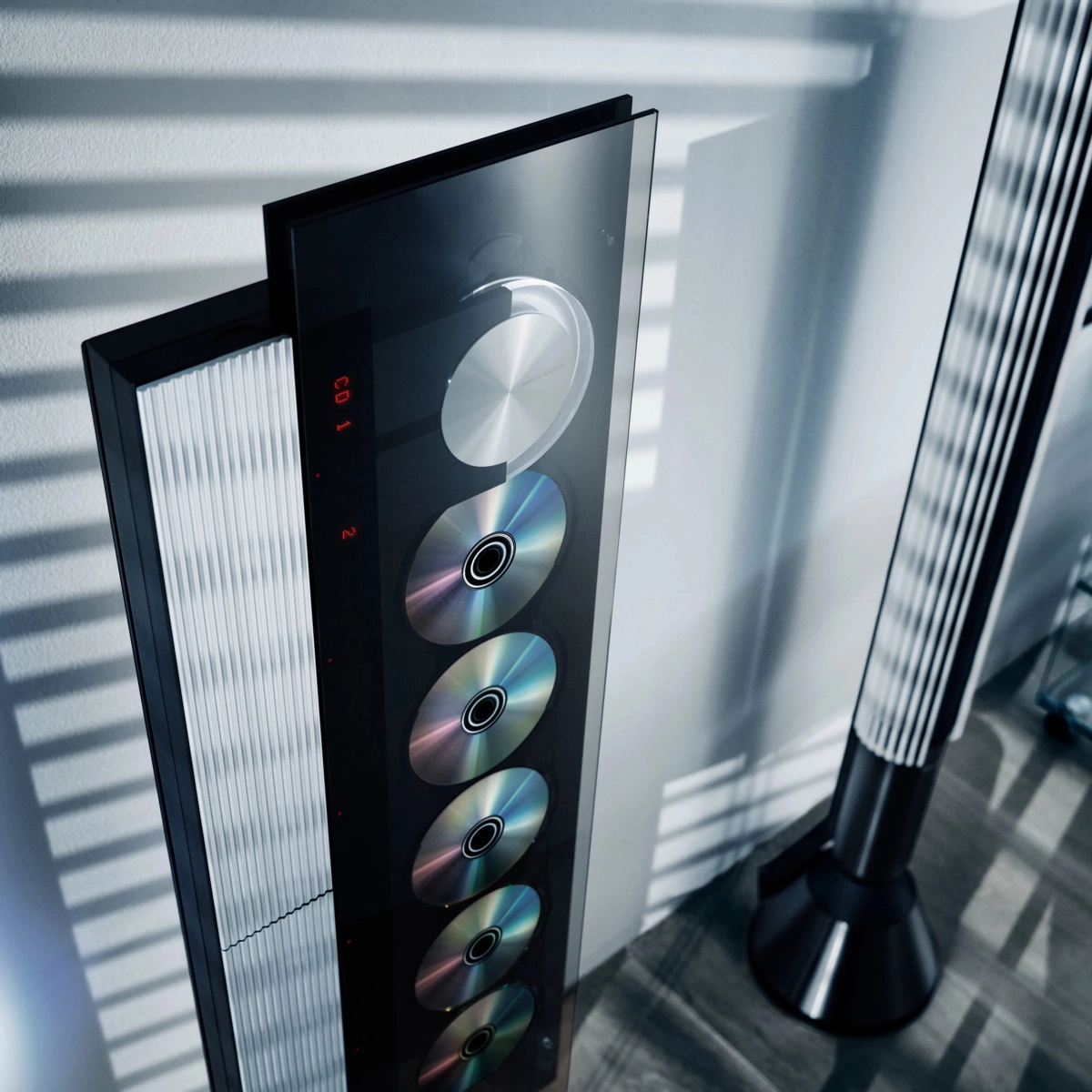Beosystem 9000c s dvojicí reproduktorů Beolab 28 v designovém obývacím pokoji
