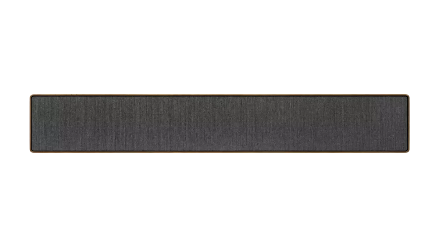 Detail textilního předního panelu a hliníkového rámu soundbaru Beosound Stage